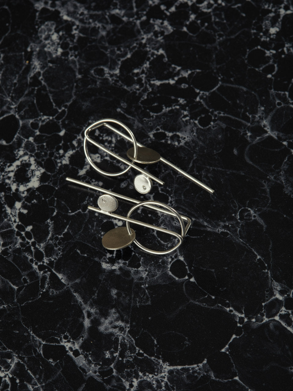 This piece is a result of an amazing collaboration between the ROAD x Contemporia.  Crafted in Sterling Silver, the earrings will uplift any outfit, regardless of your journey. The price includes one piece only.