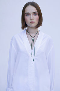 The ultimate unisex accessory has been the product of an amazing collaboration between the ROAD x Contemporia. The nature motif  is 3D carved in sterling silver. The green cord constitutes the liaison between the natural and hard elements. The medallion brings us back to the days when nobles wore the symbols dedicated to their trait. The diameter of the neck piece is 3cm.