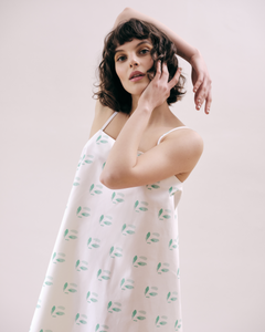 Minimalist A-shaped dress with adjustable straps and side pockets. Crafted in 100% cotton. Unique patterns designed by the ROAD.